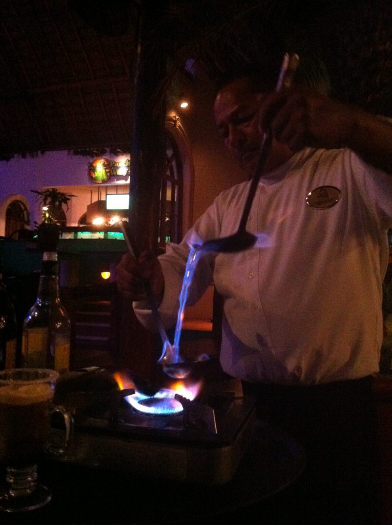 Chef making a fire coffee show.